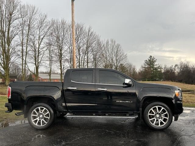 Used 2021 GMC Canyon Denali with VIN 1GTP6EE15M1227051 for sale in Angola, IN