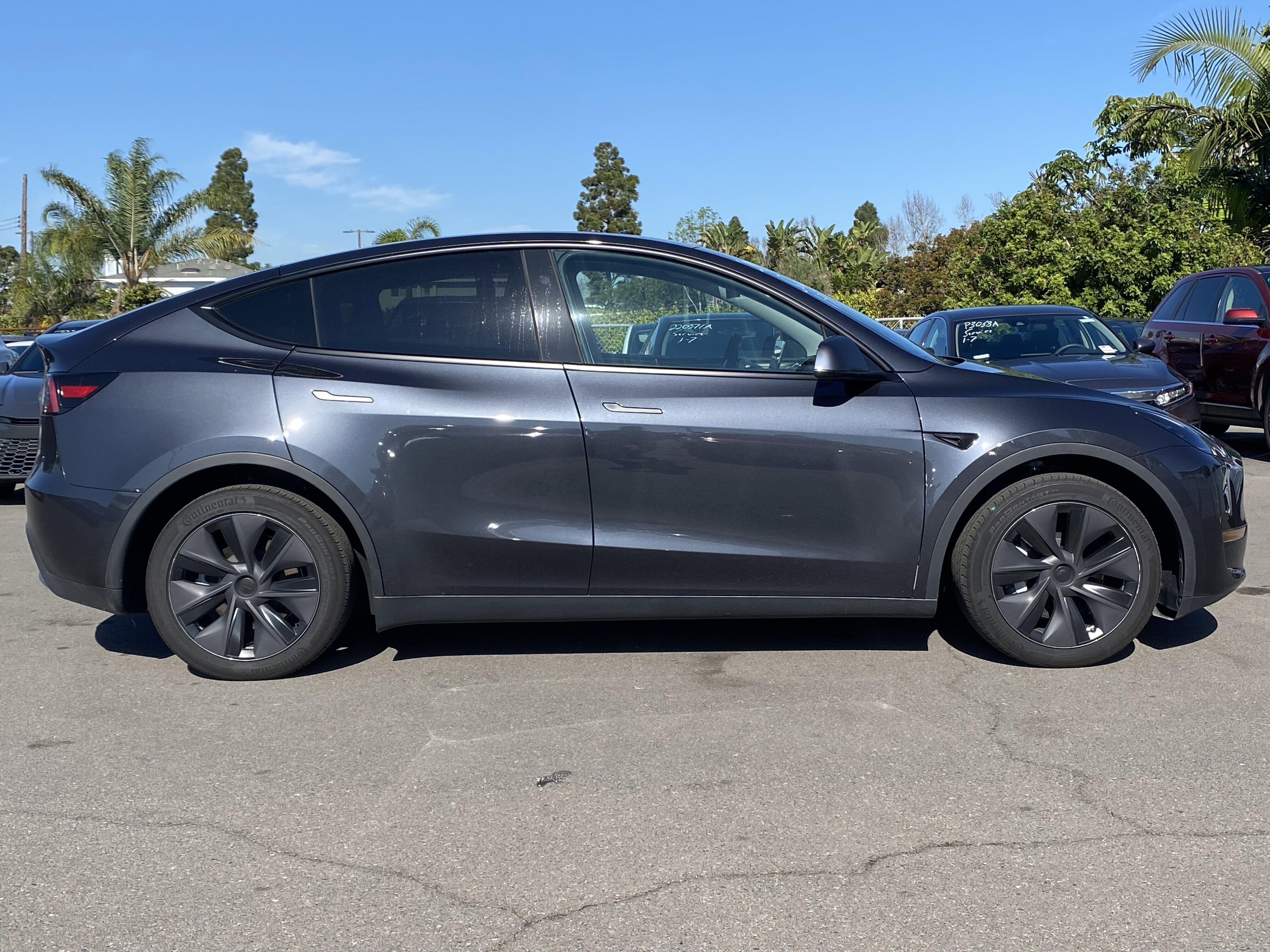 Used 2025 Tesla Model Y Long Range with VIN 7SAYGDEE4SF298974 for sale in Huntington Beach, CA