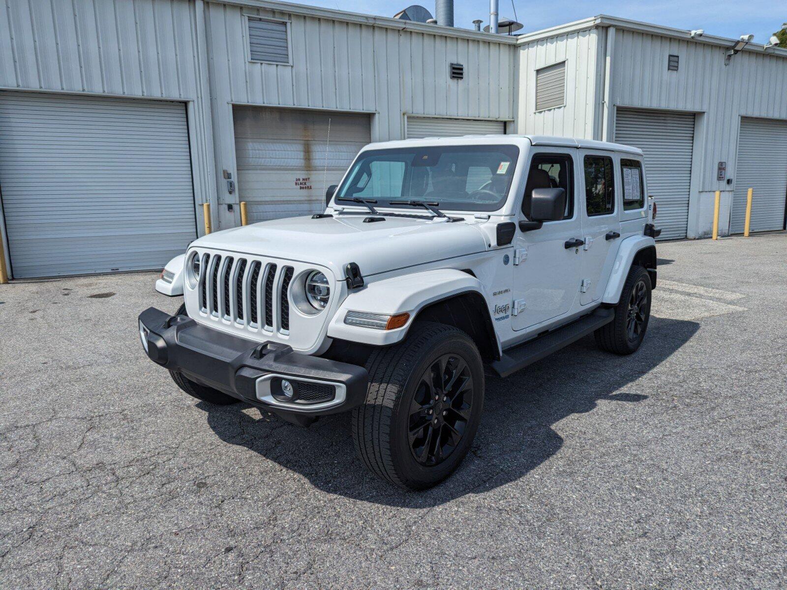 Used 2021 Jeep Wrangler Unlimited Sahara 4XE with VIN 1C4JJXP69MW830001 for sale in Cockeysville, MD