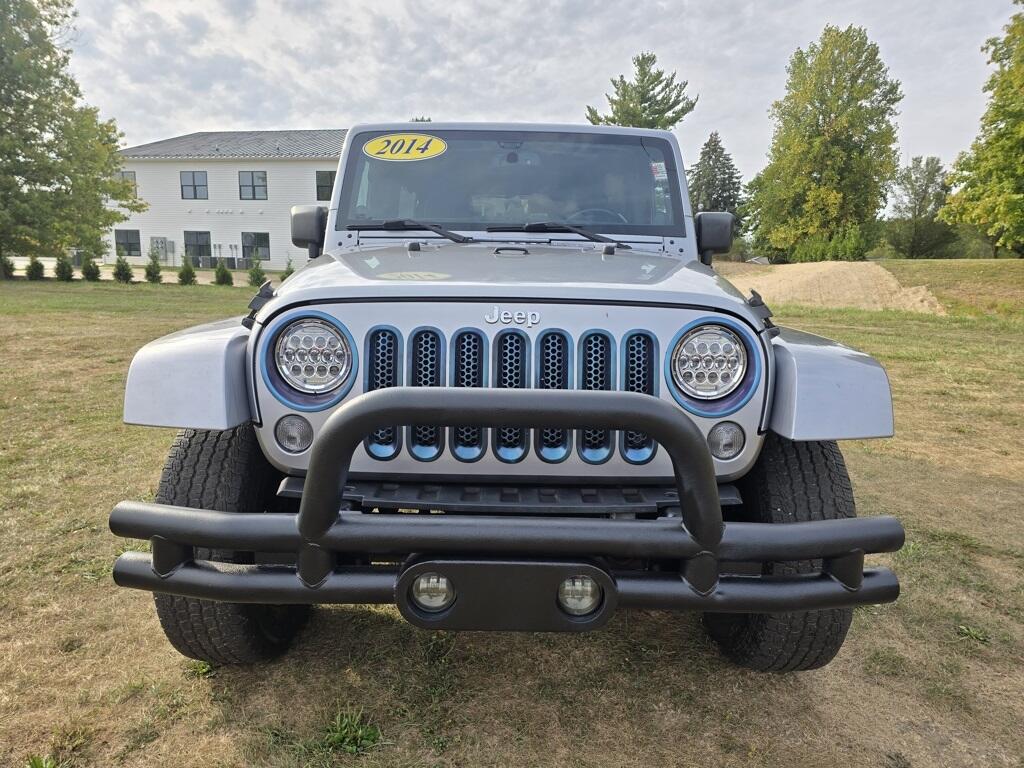 Used 2014 Jeep Wrangler Unlimited Sahara with VIN 1C4BJWEG9EL164478 for sale in Angola, IN