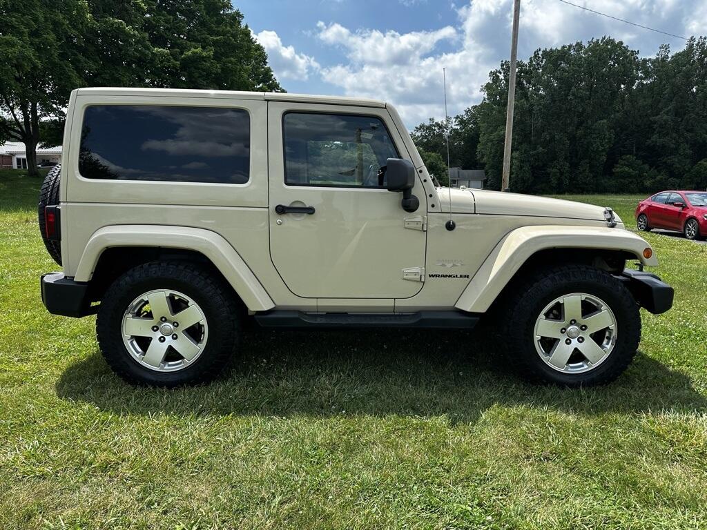 Used 2011 Jeep Wrangler Sahara with VIN 1J4AA5D17BL528602 for sale in Angola, IN