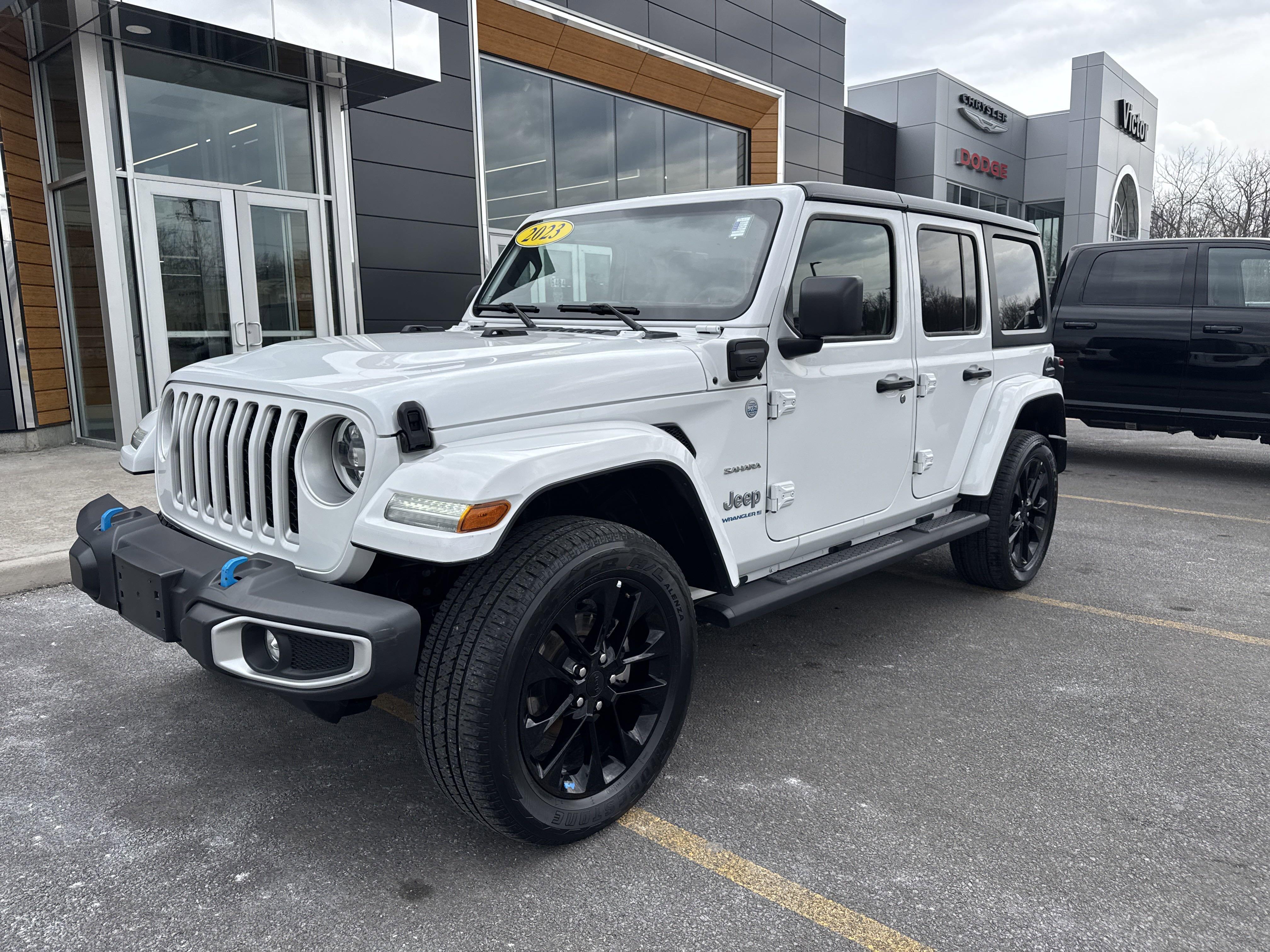 Used 2023 Jeep Wrangler 4xe Sahara 4XE with VIN 1C4JJXP60PW630371 for sale in Victor, NY