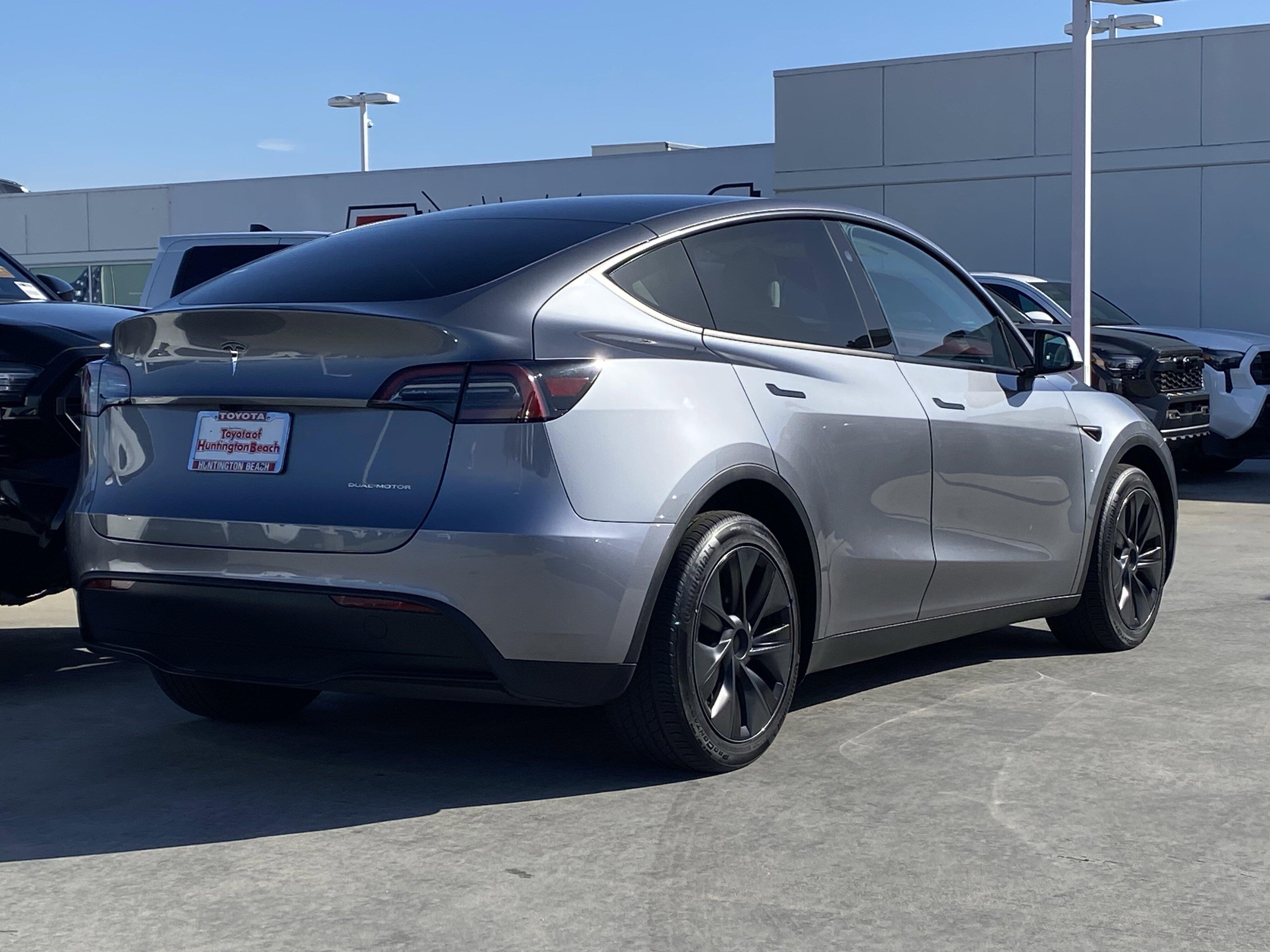 Used 2024 Tesla Model Y Long Range with VIN 7SAYGDEE6RF206323 for sale in Huntington Beach, CA