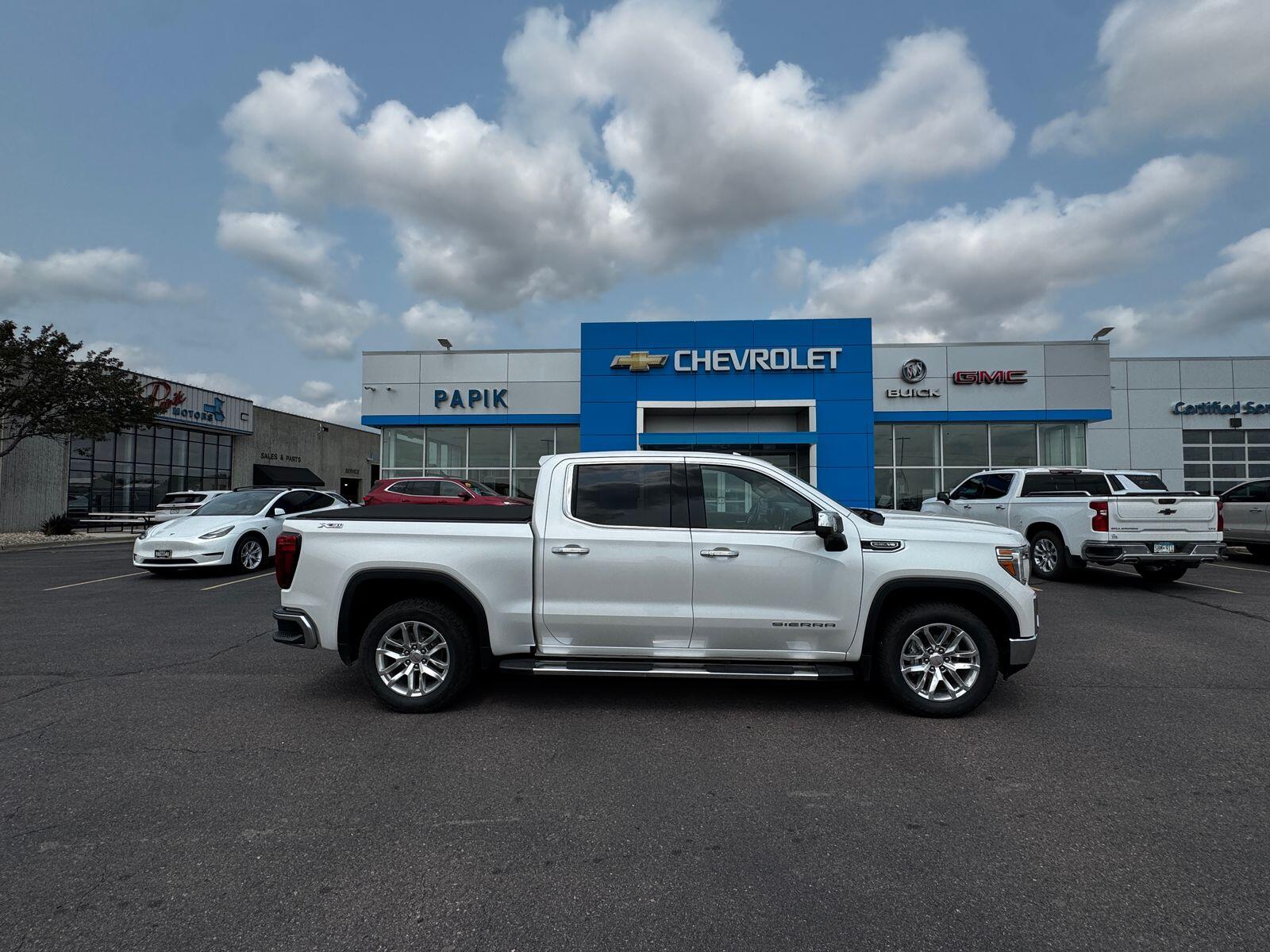 Used 2021 GMC Sierra 1500 SLT with VIN 3GTU9DED2MG406454 for sale in Luverne, Minnesota