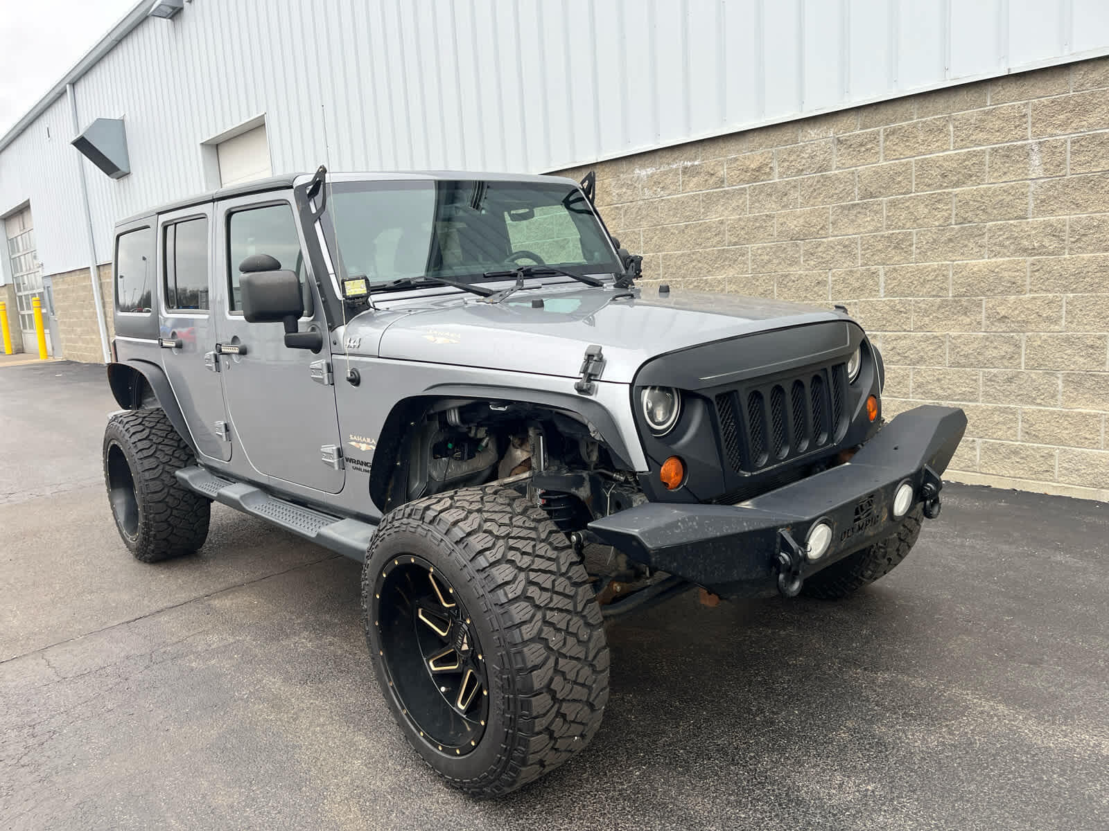 Used 2013 Jeep Wrangler Unlimited Sahara with VIN 1C4BJWEG9DL544113 for sale in Wilmington, OH