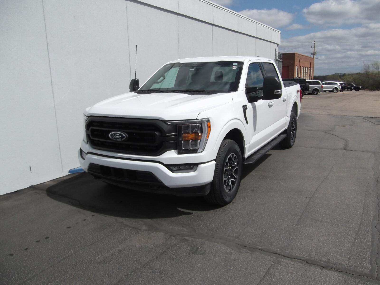 Used 2023 Ford F-150 XLT with VIN 1FTFW1E86PKD43357 for sale in Kansas City