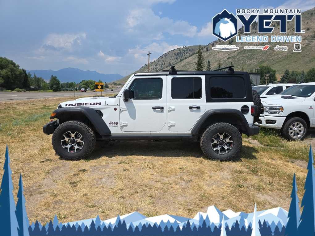 Used 2021 Jeep Wrangler Unlimited Rubicon with VIN 1C4JJXFM2MW818563 for sale in Jackson, WY