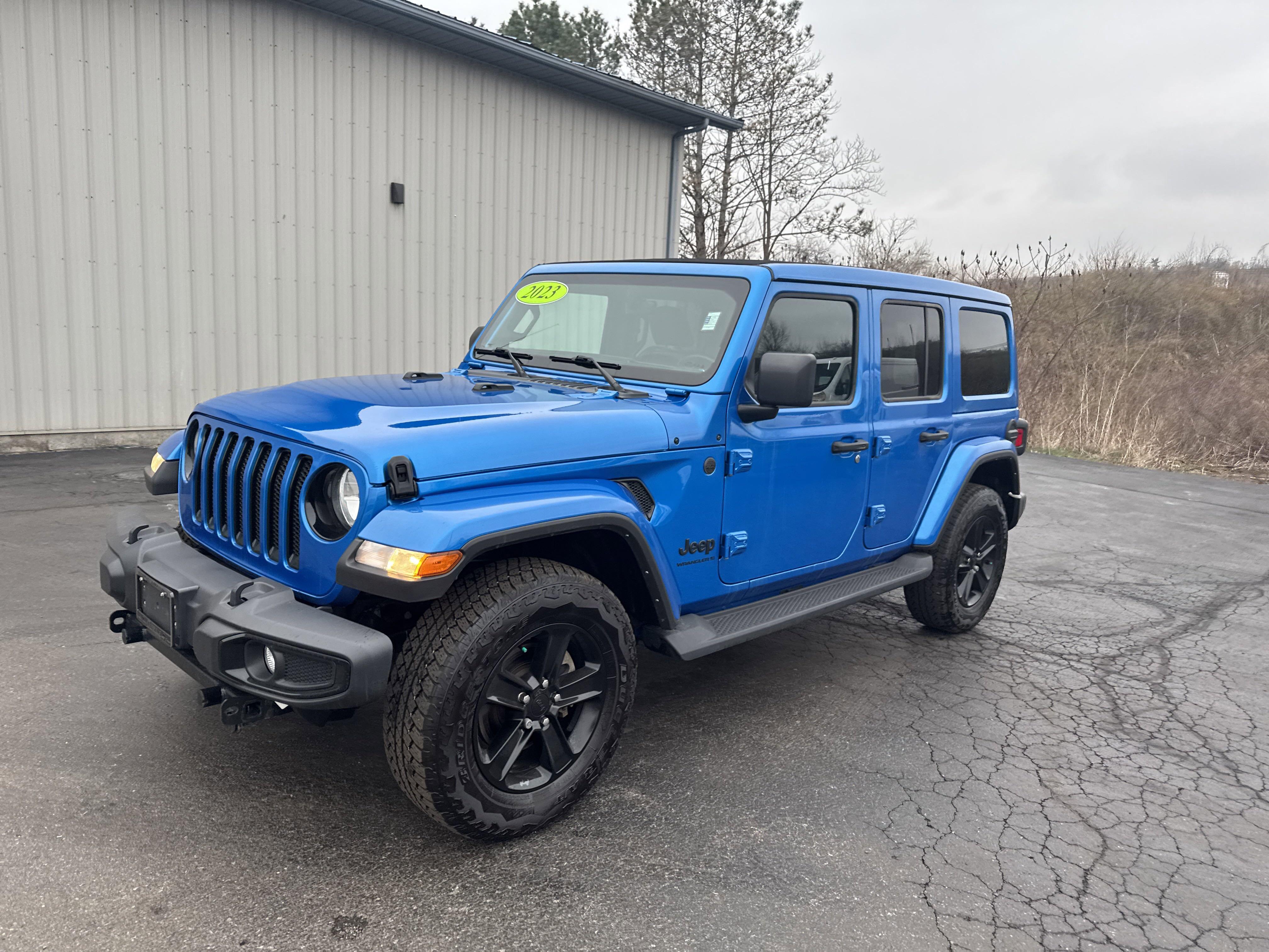 Used 2023 Jeep Wrangler 4-Door Sahara Altitude with VIN 1C4HJXEN6PW585137 for sale in Victor, NY