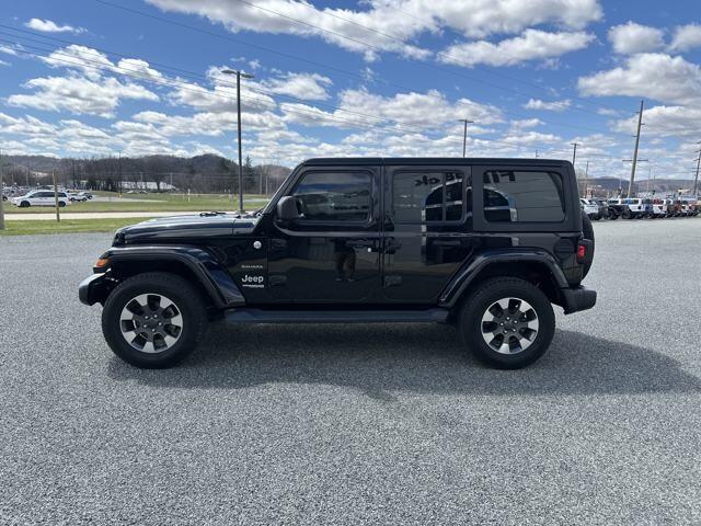 Used 2021 Jeep Wrangler Unlimited Sahara with VIN 1C4HJXEN9MW823610 for sale in Prairie Du Chien, WI