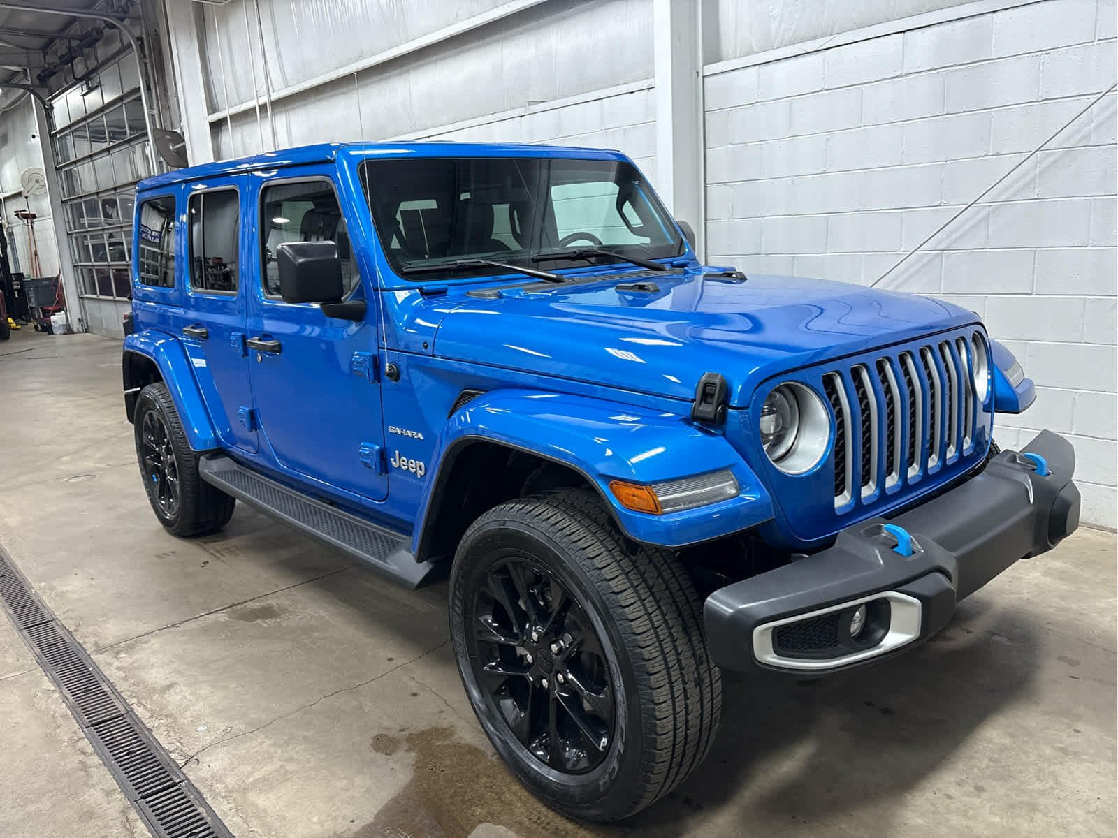 Used 2023 Jeep Wrangler 4xe Sahara 4XE with VIN 1C4JJXP68PW554186 for sale in Wilmington, OH