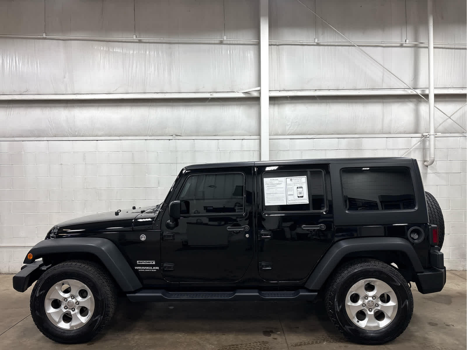 Used 2016 Jeep Wrangler Unlimited Sport with VIN 1C4BJWDG4GL155756 for sale in Wilmington, OH