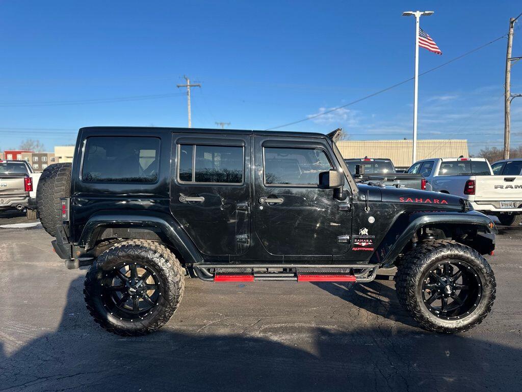 Used 2012 Jeep Wrangler Unlimited Sahara with VIN 1C4BJWEG0CL283257 for sale in Angola, IN