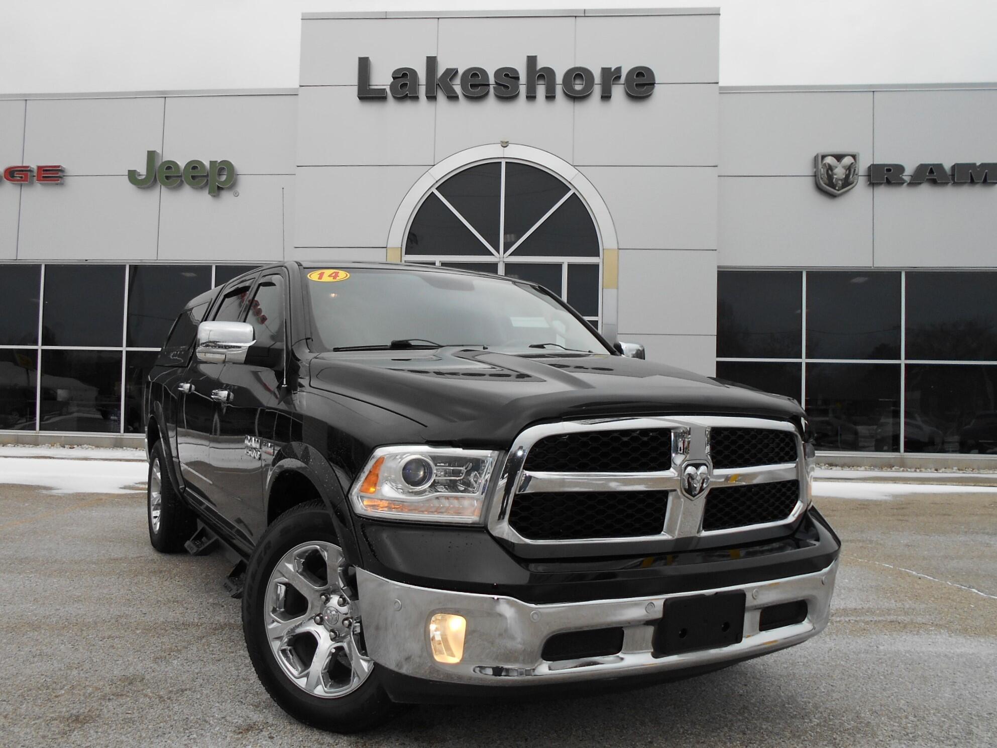 Used 2014 RAM Ram 1500 Pickup Laramie with VIN 1C6RR7NT0ES348005 for sale in Montague, MI