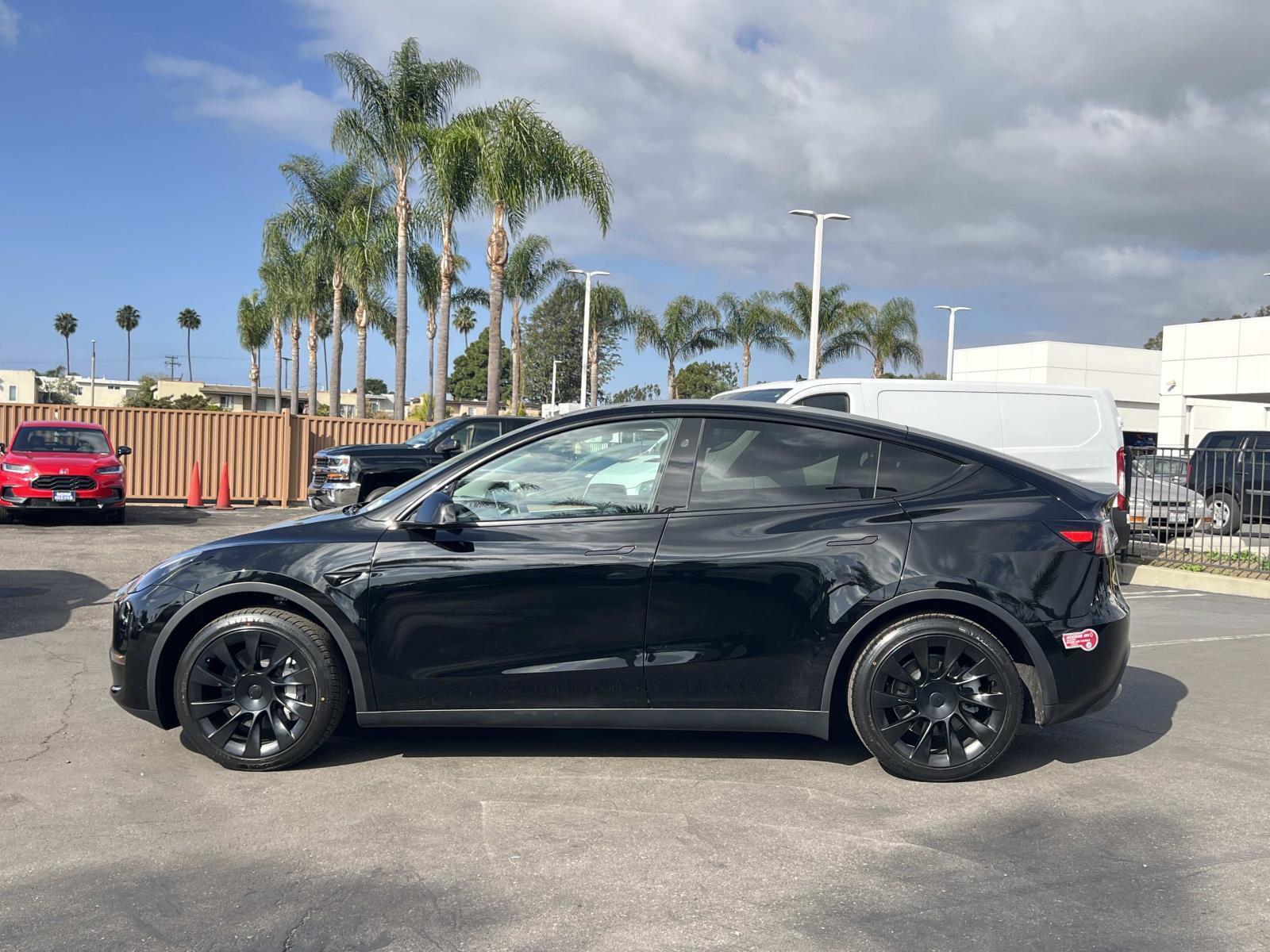 Used 2024 Tesla Model Y Long Range with VIN 7SAYGDED3RF015255 for sale in Huntington Beach, CA