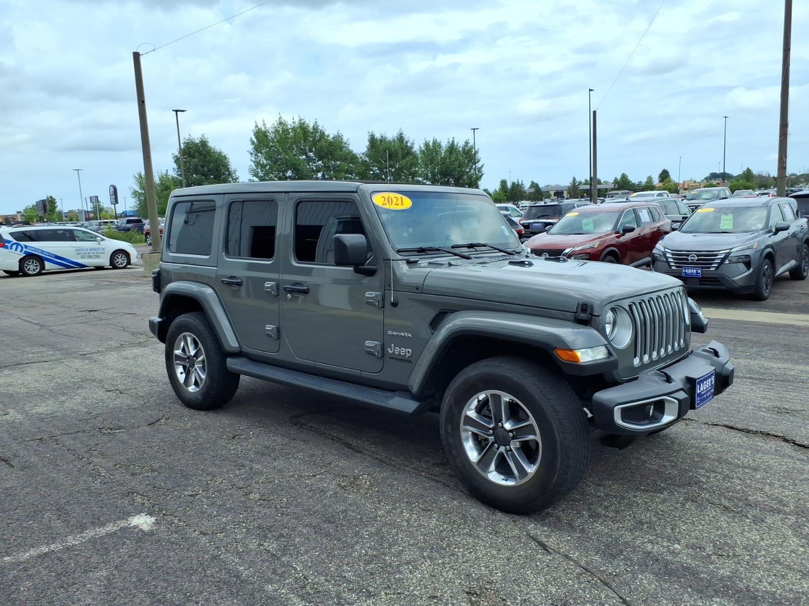 Used 2021 Jeep Wrangler Unlimited Sahara with VIN 1C4HJXEG0MW555757 for sale in Mankato, Minnesota