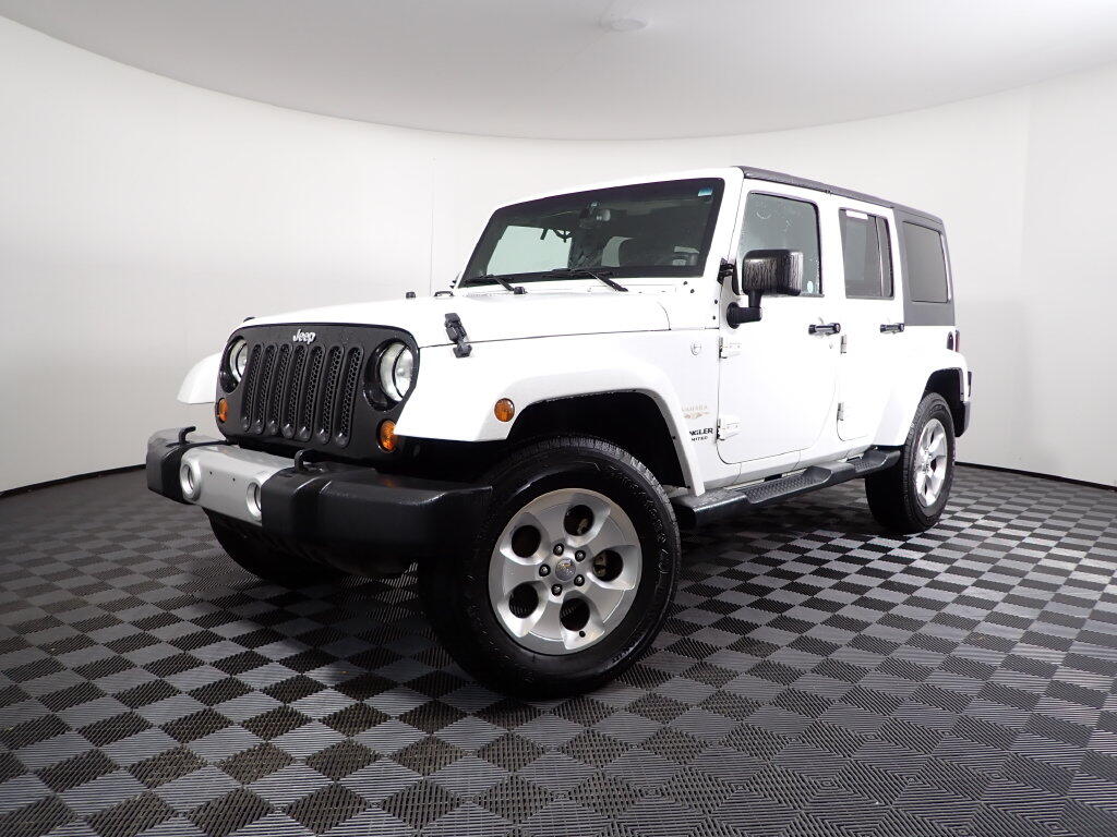 Used 2013 Jeep Wrangler Unlimited Sahara with VIN 1C4BJWEG7DL590152 for sale in Rockbridge, OH