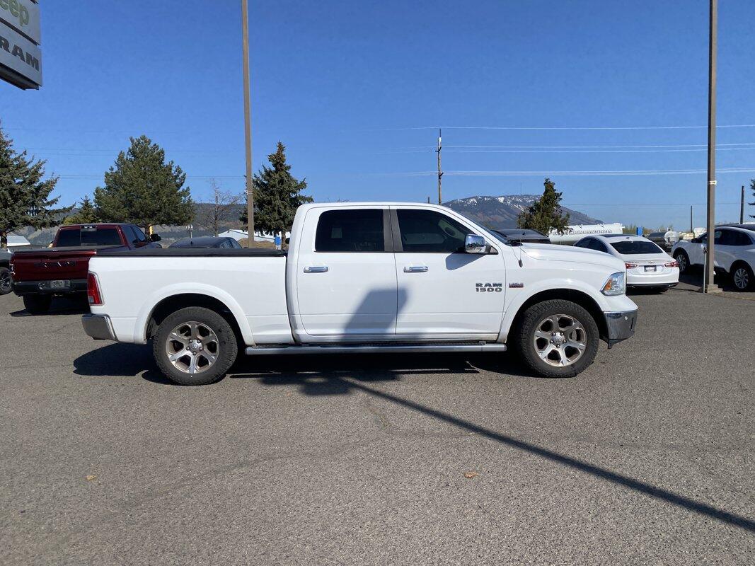 Used 2015 RAM Ram 1500 Pickup Laramie with VIN 1C6RR7VT0FS607058 for sale in Island City, OR