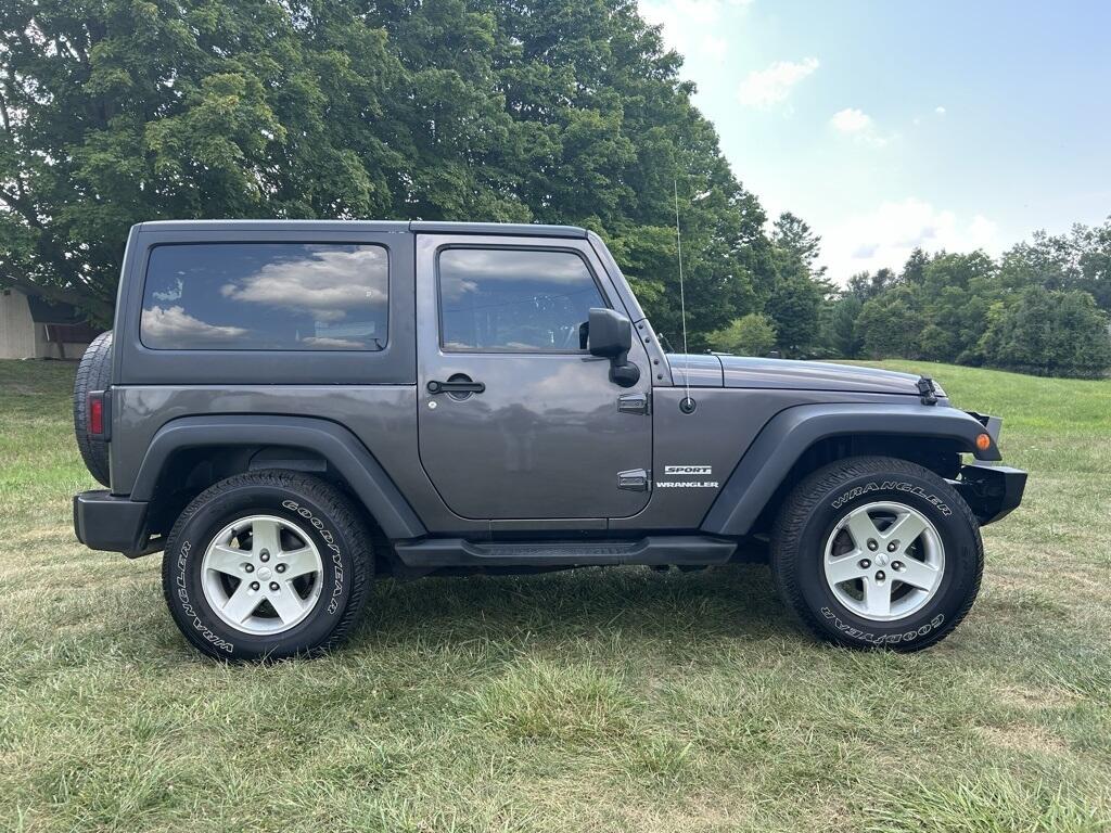 Used 2014 Jeep Wrangler Sport with VIN 1C4AJWAG2EL295995 for sale in Angola, IN