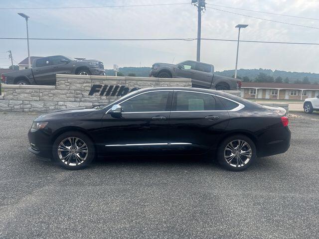 Used 2014 Chevrolet Impala 2LZ with VIN 1G1155S38EU157875 for sale in Prairie du Chien, WI