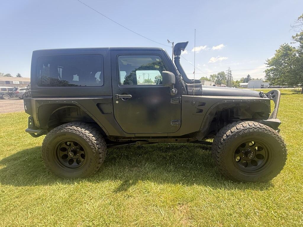 Used 2014 Jeep Wrangler Sport with VIN 1C4AJWAG0EL144217 for sale in Angola, IN