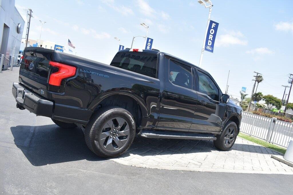 Used 2023 Ford F-150 Lightning XLT with VIN 1FTVW1EL9PWG27865 for sale in Huntington Beach, CA