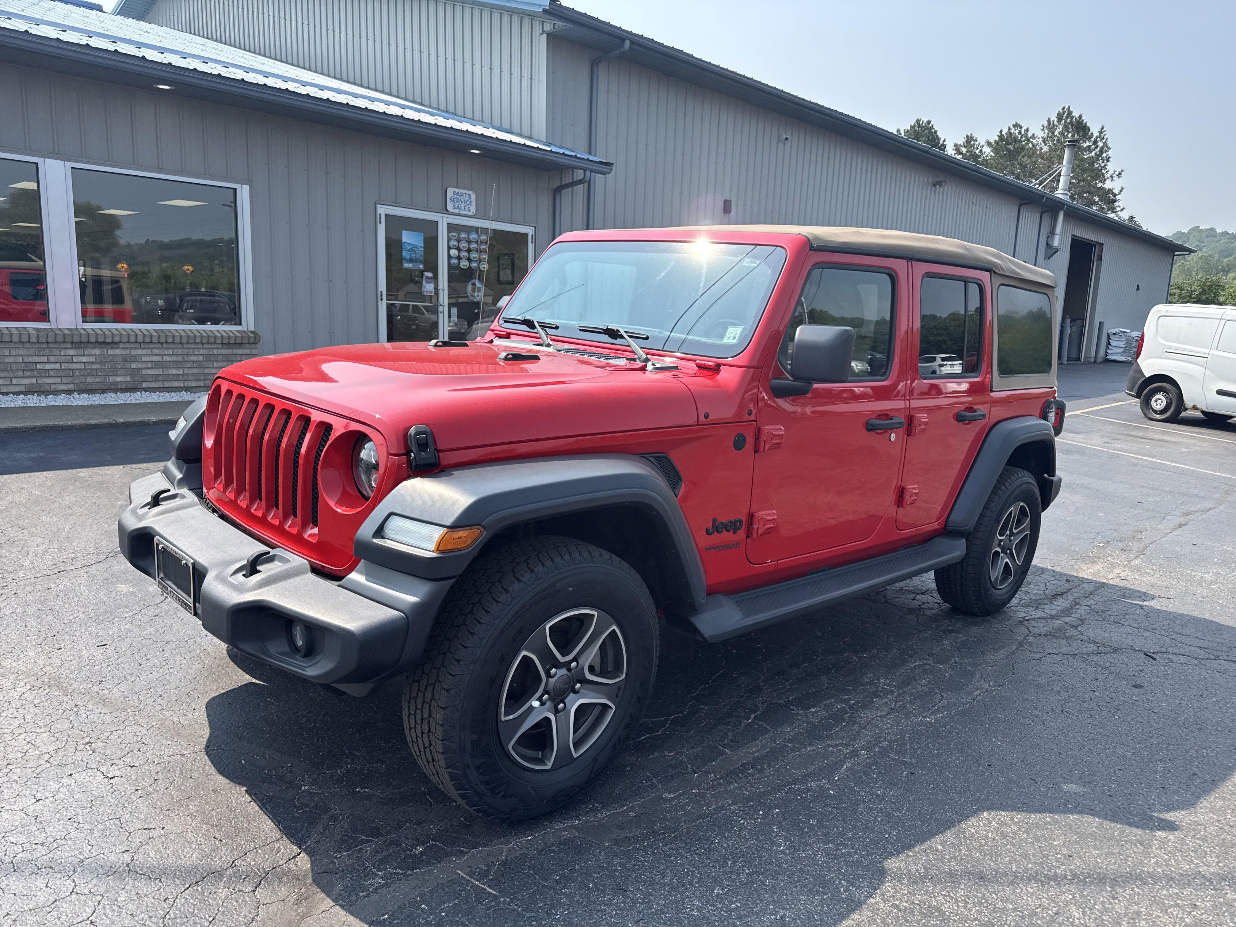 Used 2020 Jeep Wrangler Unlimited Black and Tan with VIN 1C4HJXDN4LW275435 for sale in Dansville, NY