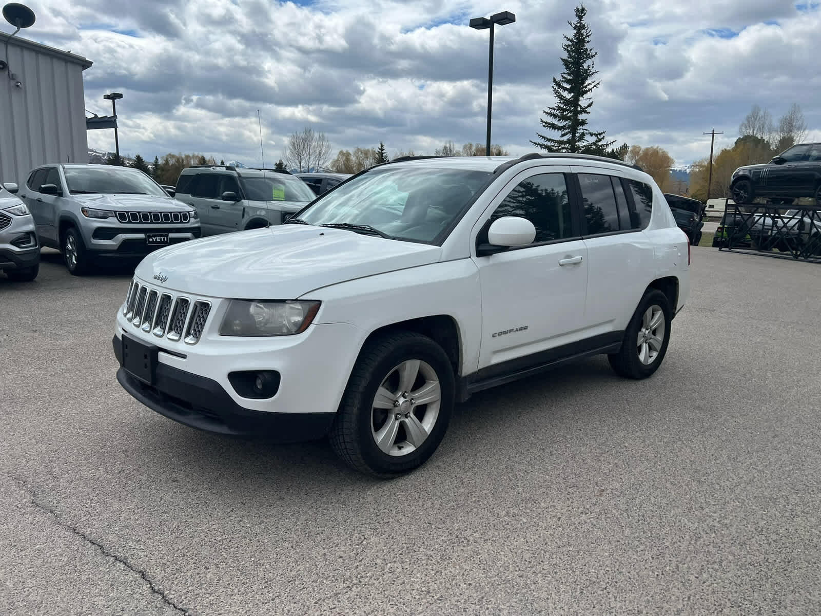 Used 2016 Jeep Compass Latitude with VIN 1C4NJDEB6GD637935 for sale in Jackson, WY
