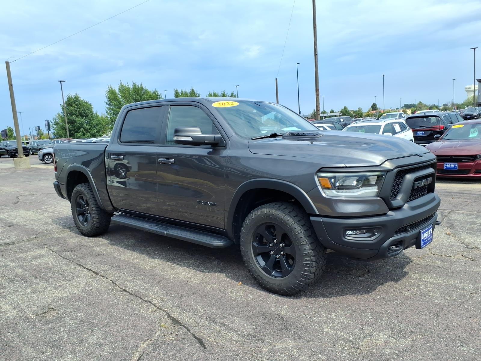 Used 2022 RAM Ram 1500 Pickup Rebel with VIN 1C6SRFLT2NN303323 for sale in Mankato, Minnesota