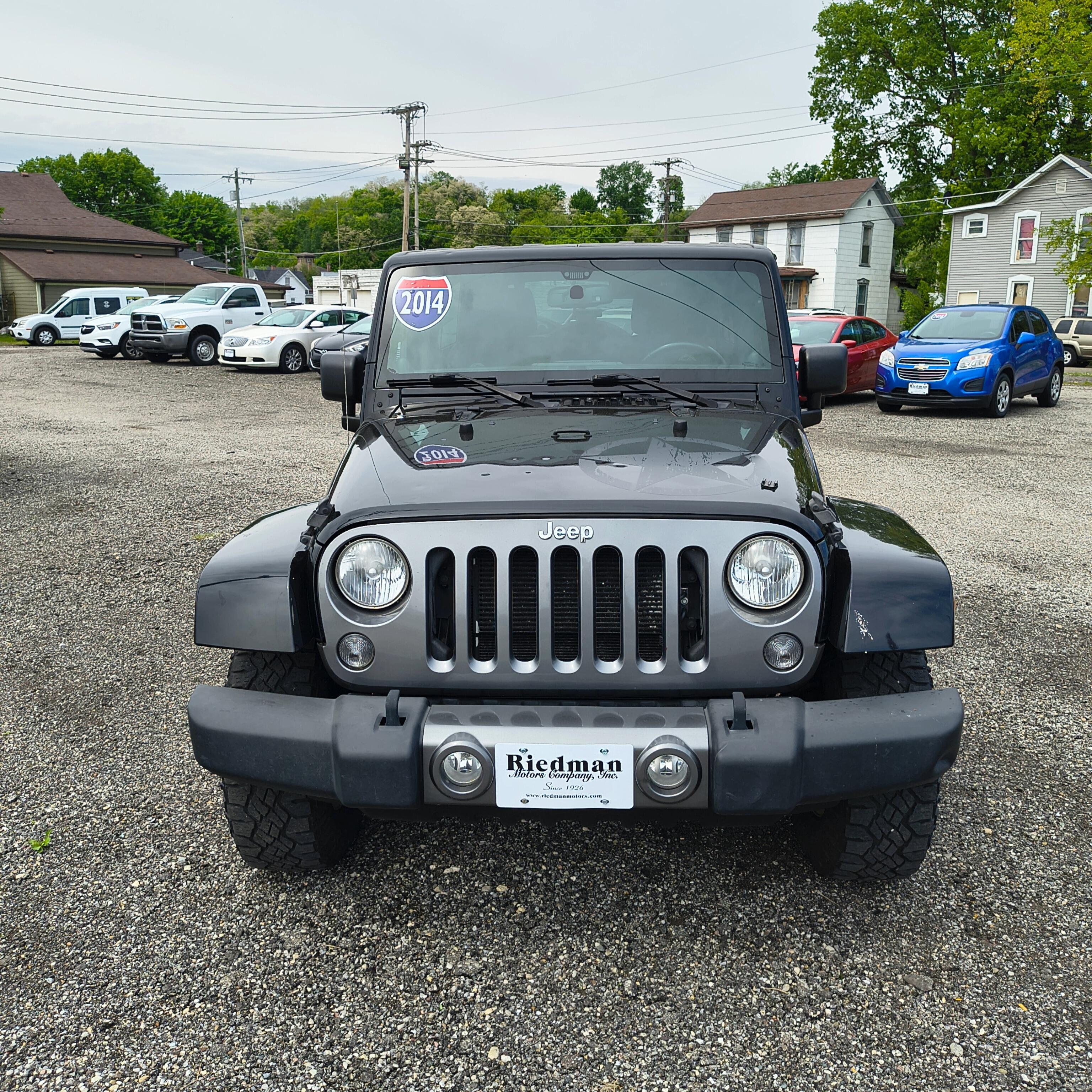 Used 2014 Jeep Wrangler Unlimited Freedom Edition with VIN 1C4BJWDG2EL179728 for sale in Connersville, IN
