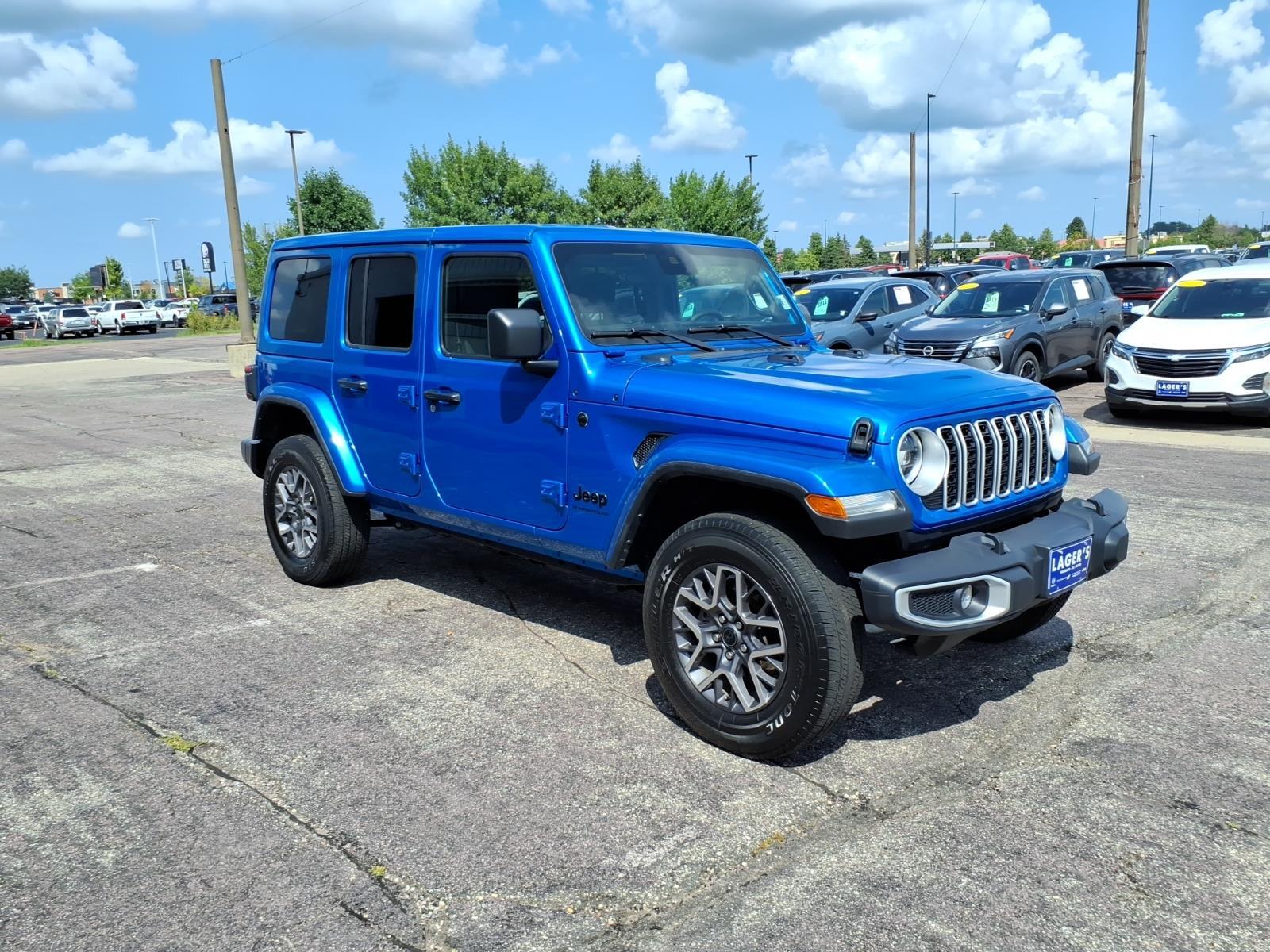 Used 2025 Jeep Wrangler 4-Door Sahara with VIN 1C4PJXEN1SW568587 for sale in Mankato, Minnesota