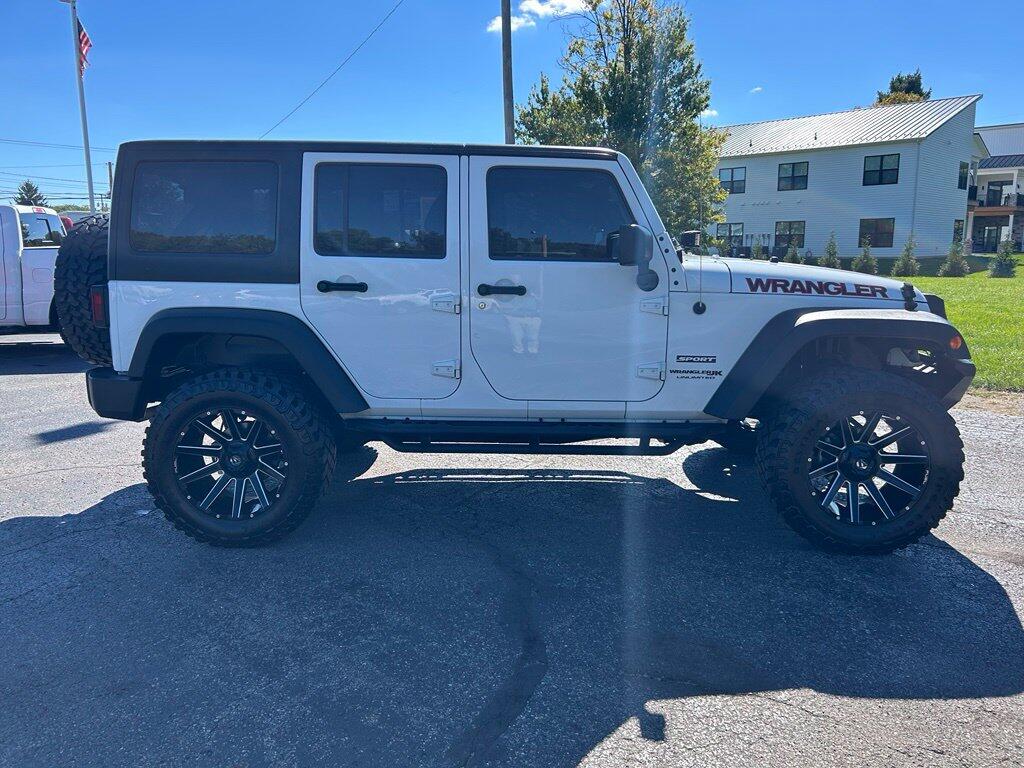 Used 2018 Jeep Wrangler JK Unlimited Sport with VIN 1C4BJWDG5JL813947 for sale in Angola, IN