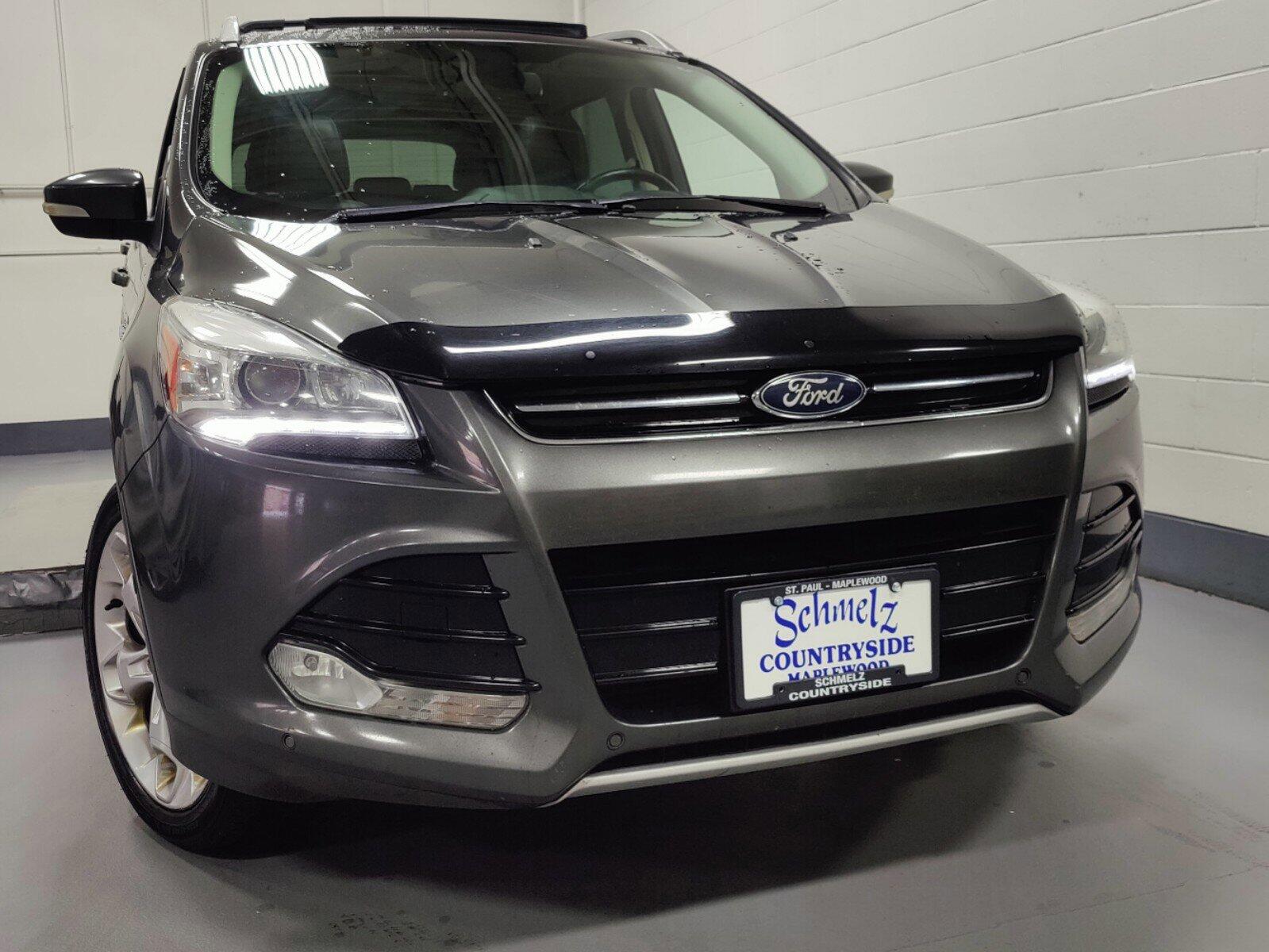 Used 2015 Ford Escape Titanium with VIN 1FMCU9J96FUB99068 for sale in Maplewood, Minnesota