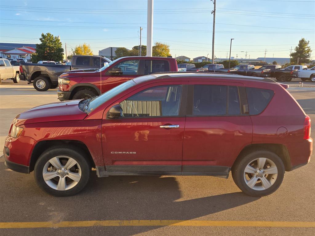 Used 2016 Jeep Compass Sport with VIN 1C4NJDBB3GD780670 for sale in Garden City, KS