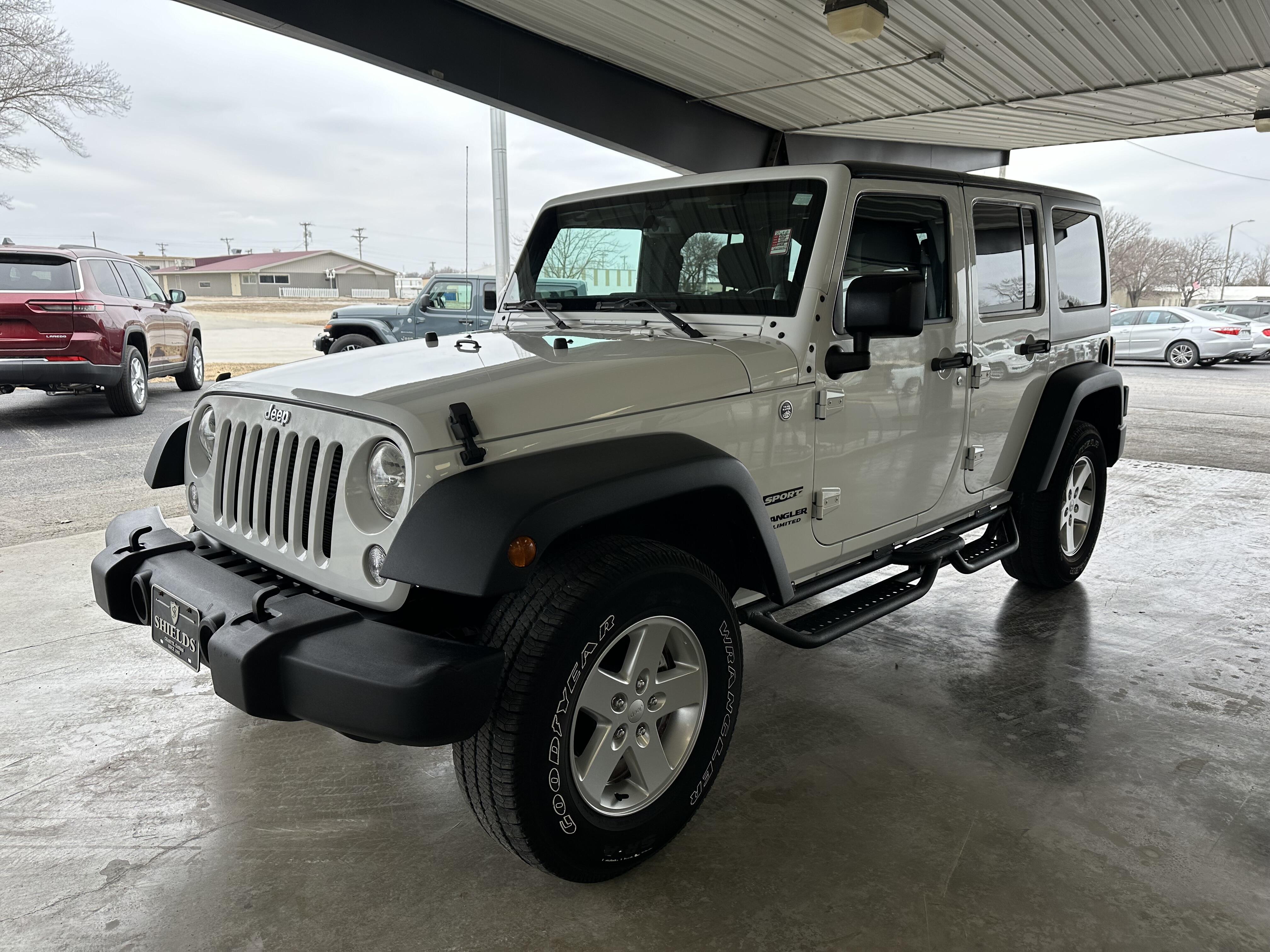 Used 2014 Jeep Wrangler Unlimited Sport with VIN 1C4BJWDGXEL270293 for sale in Chanute, KS