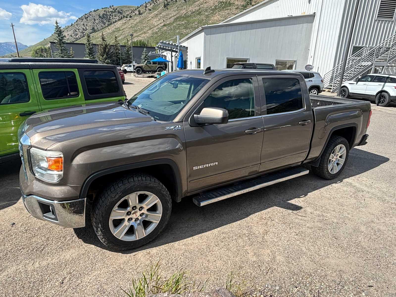 Used 2015 GMC Sierra 1500 SLE with VIN 3GTU2UEC9FG422245 for sale in Jackson, WY