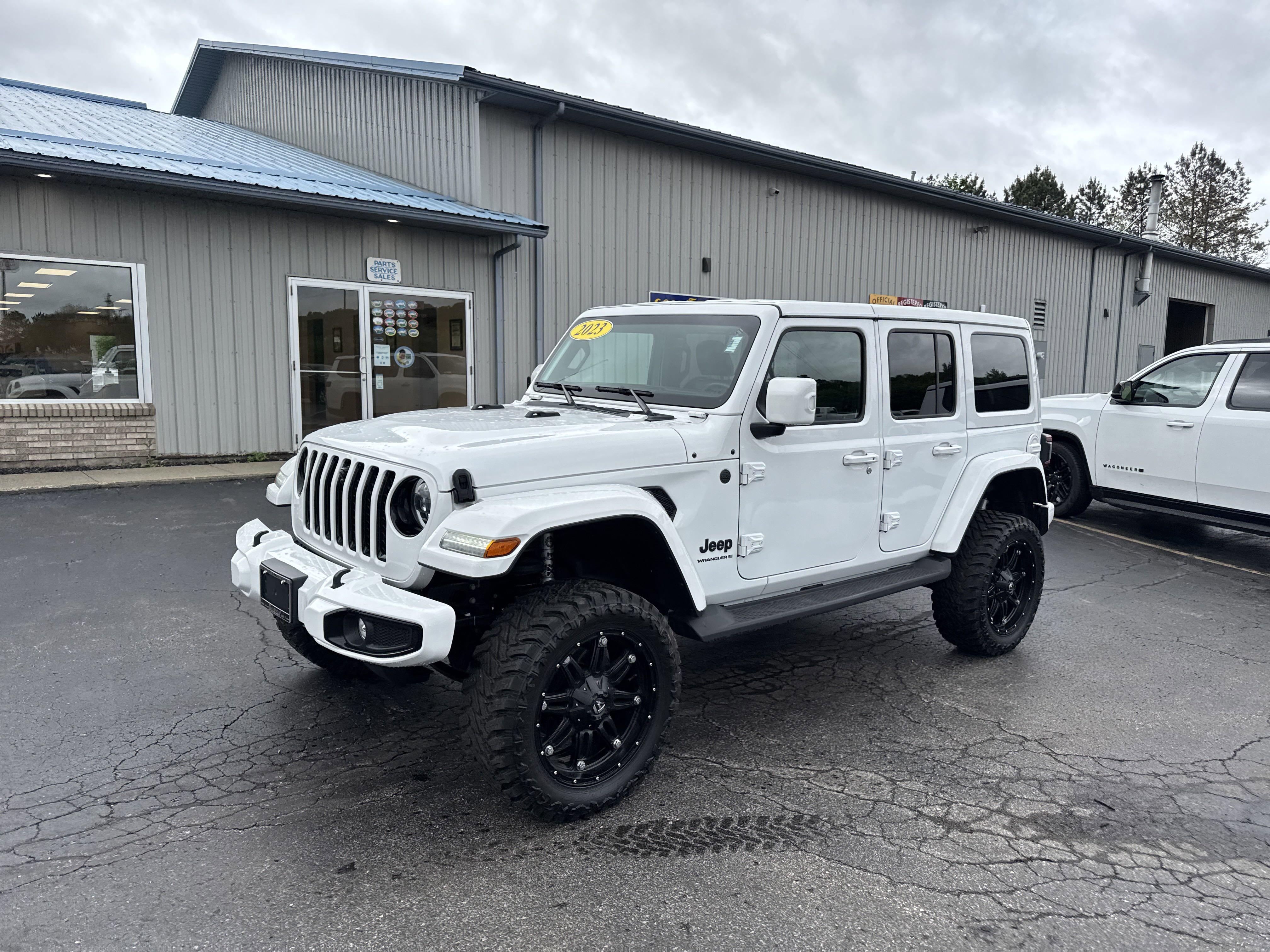Used 2023 Jeep Wrangler 4-Door High Altitude with VIN 1C4HJXEG8PW583942 for sale in Victor, NY