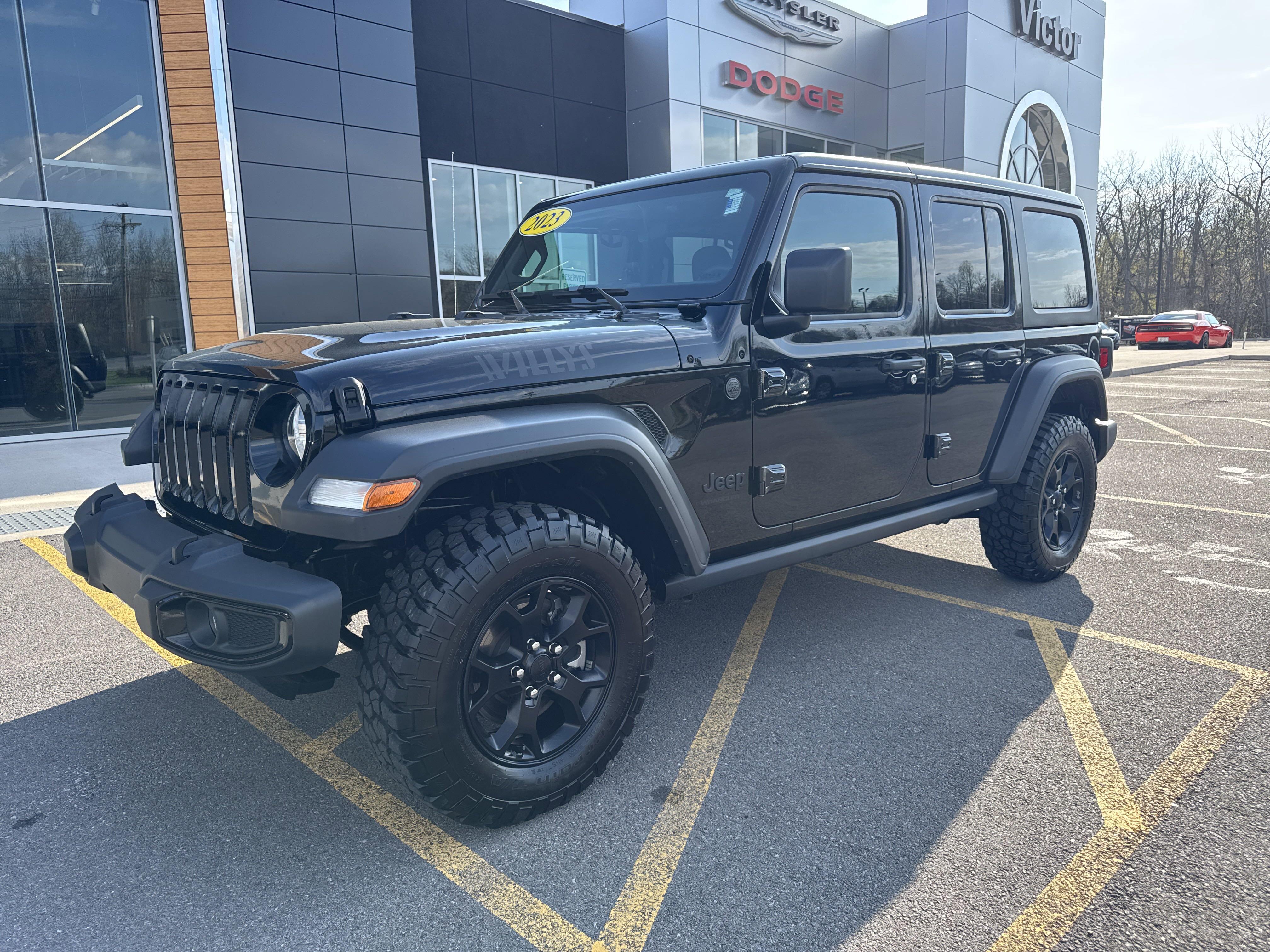 Used 2023 Jeep Wrangler 4-Door Willys Sport with VIN 1C4HJXDGXPW522593 for sale in Victor, NY