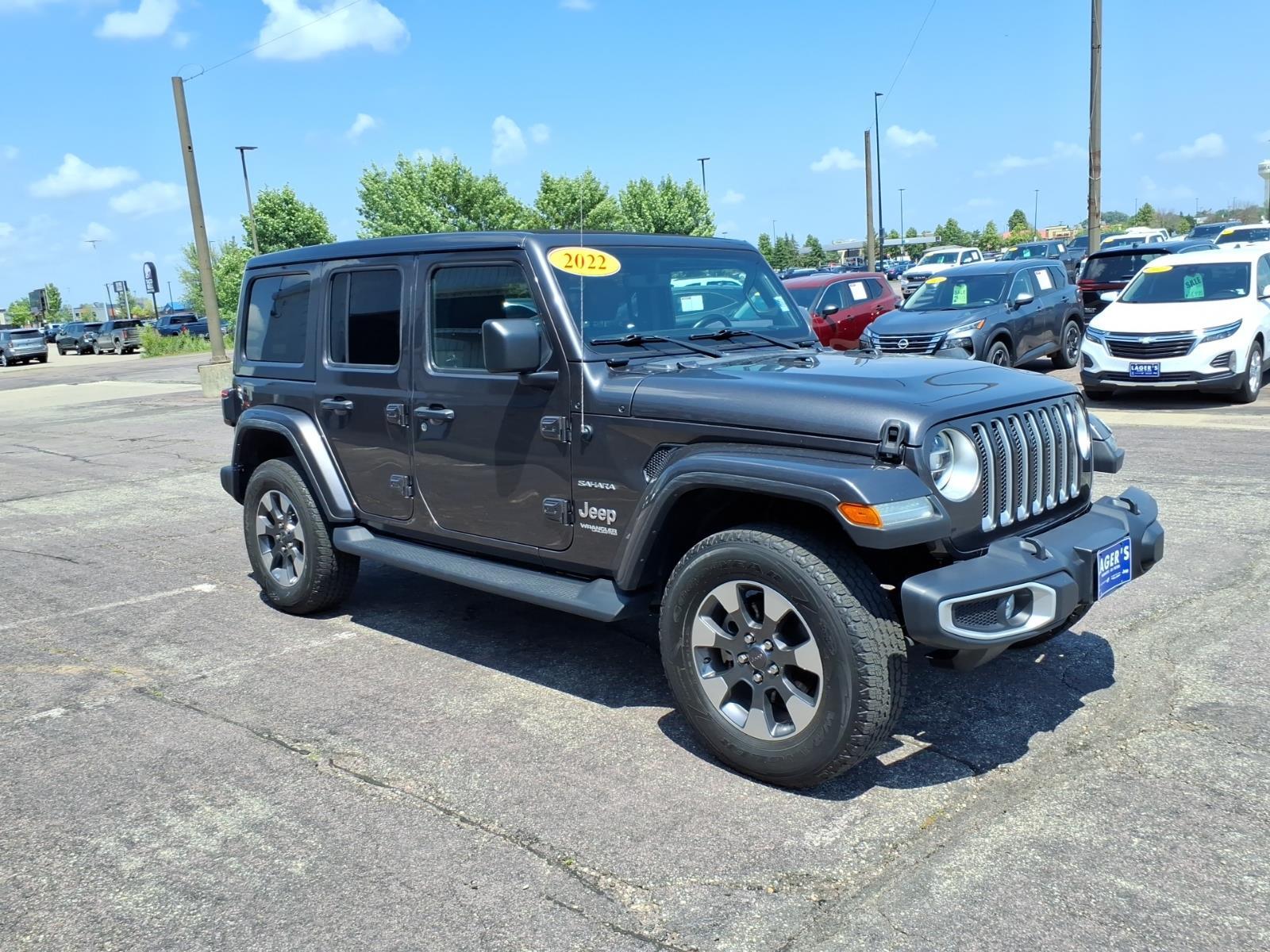 Used 2022 Jeep Wrangler Unlimited Sahara with VIN 1C4HJXEG5NW197170 for sale in Mankato, Minnesota