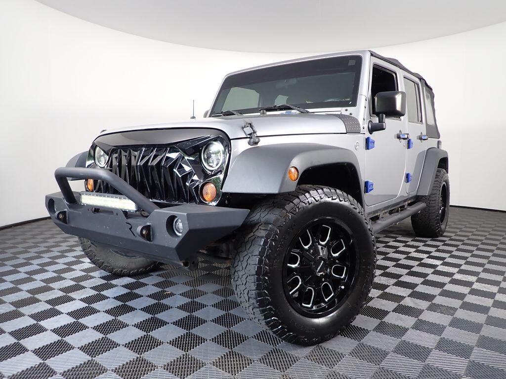 Used 2016 Jeep Wrangler Unlimited Sport with VIN 1C4BJWDG2GL143038 for sale in Rockbridge, OH