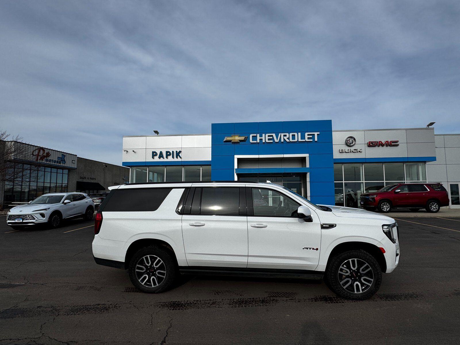 Used 2021 GMC Yukon XL AT4 with VIN 1GKS2HKD3MR180596 for sale in Luverne, Minnesota