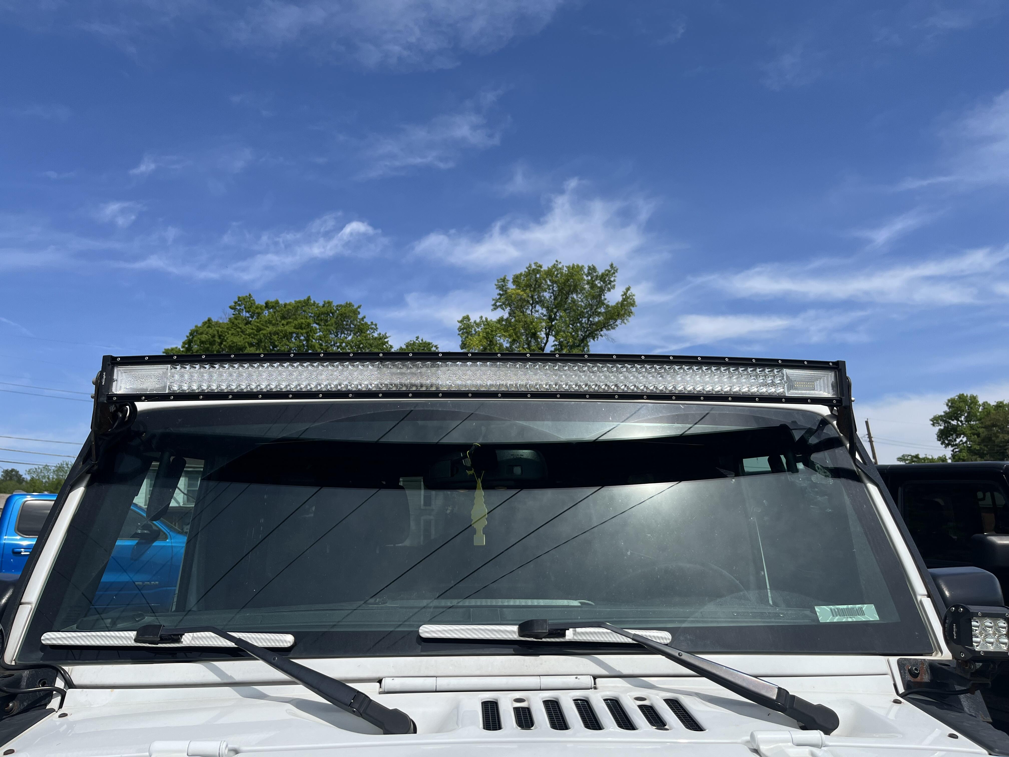 Used 2016 Jeep Wrangler Unlimited Willys Wheeler with VIN 1C4BJWDG9GL209617 for sale in Connersville, IN