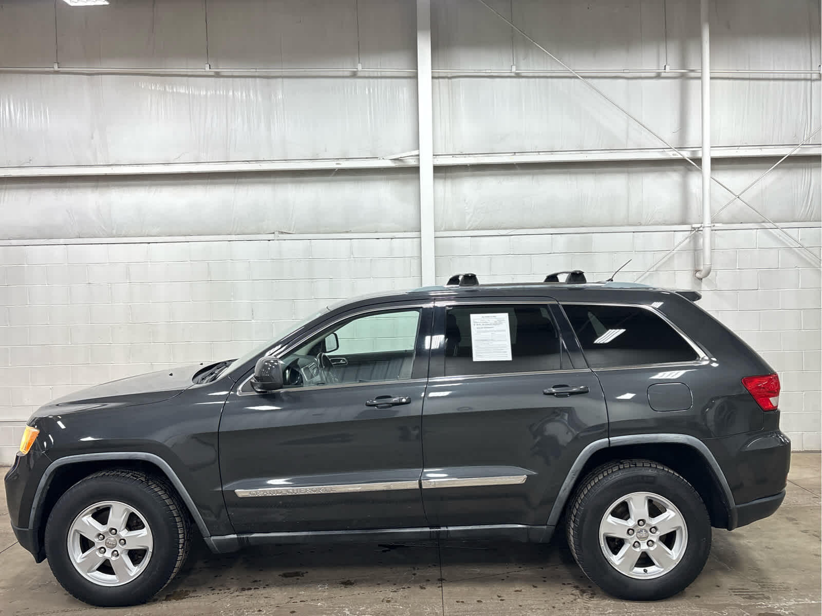 Used 2011 Jeep Grand Cherokee Laredo with VIN 1J4RR4GG9BC571716 for sale in Wilmington, OH