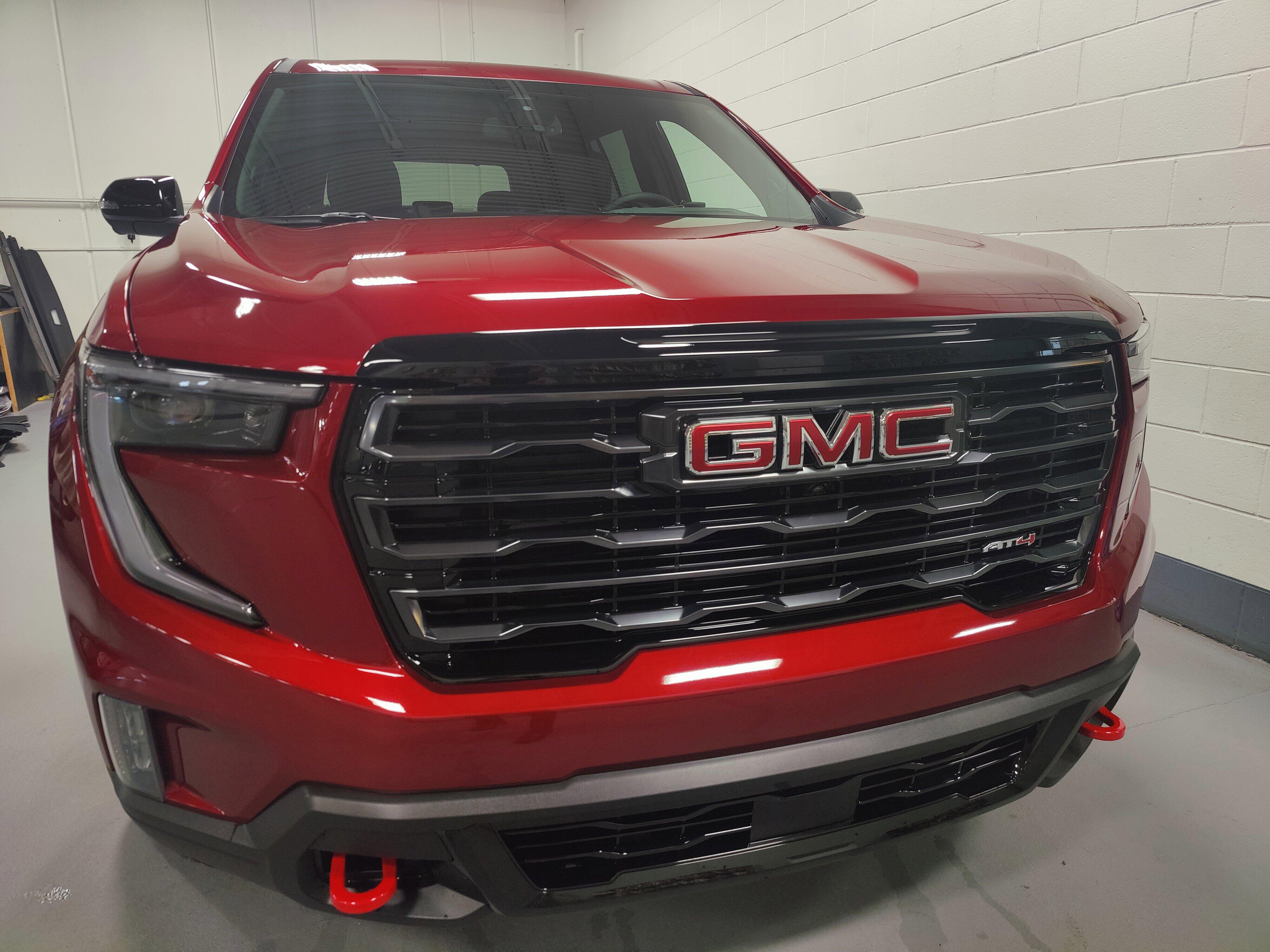 Used 2025 GMC Acadia AT4 with VIN 1GKENPRS0SJ272313 for sale in Maplewood, Minnesota