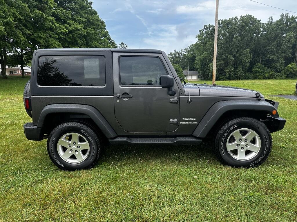 Used 2014 Jeep Wrangler Sport with VIN 1C4AJWAG2EL295995 for sale in Angola, IN